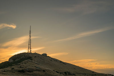 Scenic view of mountains against sky during sunset