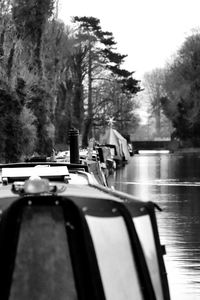 Cars on table by lake