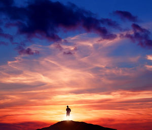 Low angle view of cloudy sky at sunset