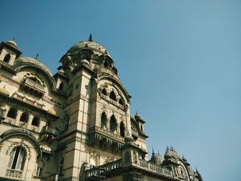 Low angle view of historic building against clear sky