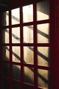 Close-up of metal grate window