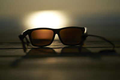 Close-up of sunglasses on table