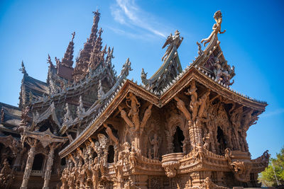 Low angle view of building against clear blue sky