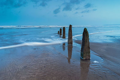 Beautiful westward ho beach groynes at dawn 