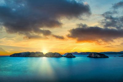 Scenic view of sea against sky during sunset