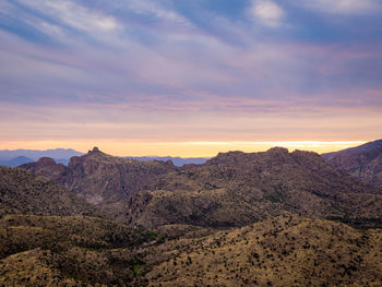Scenic view of mountains against sky during sunset
