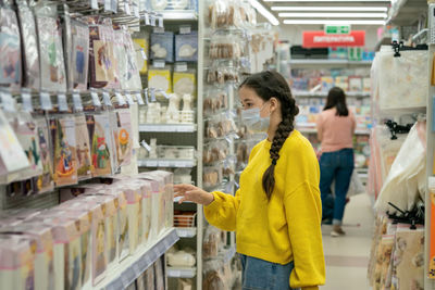 Woman standing in store