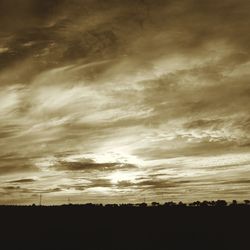 Scenic view of dramatic sky during sunset