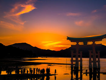 Silhouette of building at sunset