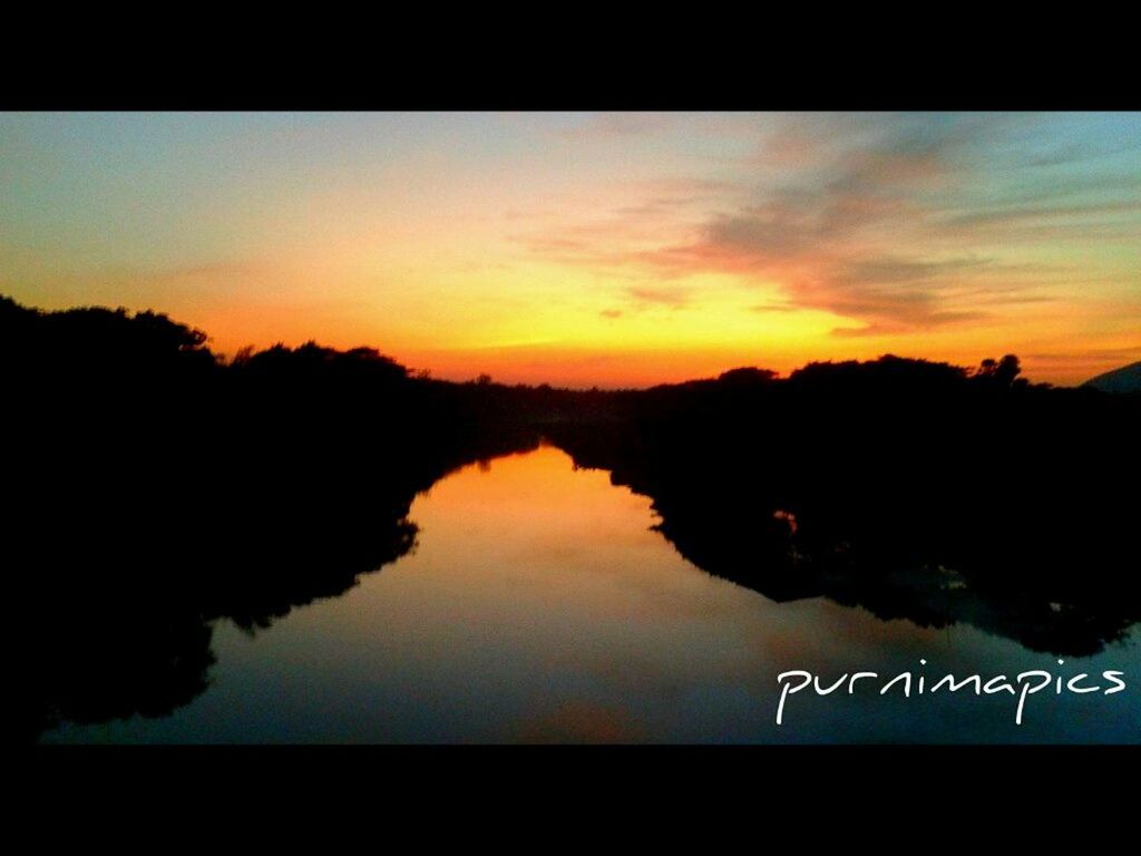 sunset, silhouette, tranquil scene, water, scenics, tranquility, reflection, beauty in nature, lake, sky, transfer print, tree, nature, idyllic, orange color, auto post production filter, calm, dusk, waterfront, river