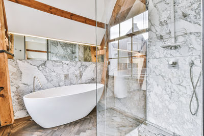 Empty bathtub in modern bathroom