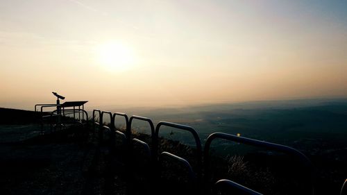 Scenic view of landscape against sky during sunset