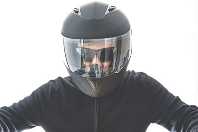 Man wearing hat against white background