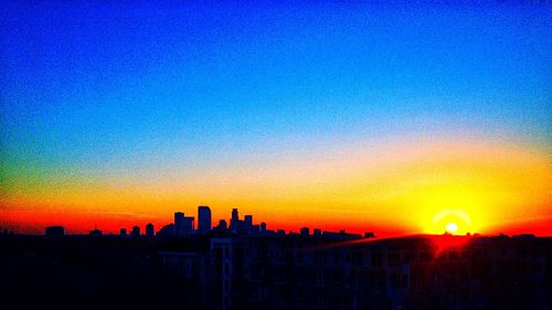 View of cityscape at sunset