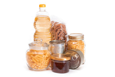 Close-up of bottles against white background