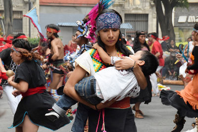 People on street in city