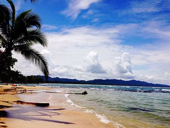 Scenic view of beach against sky