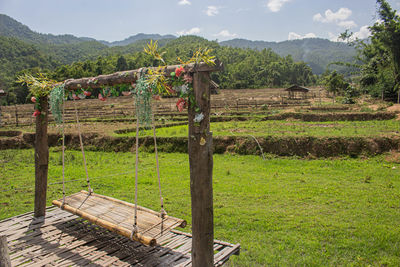 Scenic view of agricultural field against sky