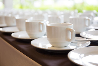 Close-up of coffee cup on table