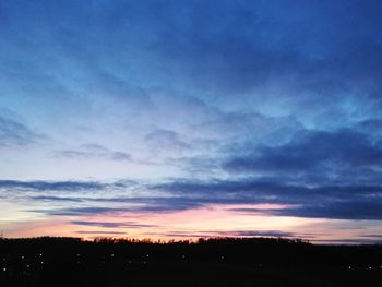 Scenic view of silhouette landscape against sky during sunset