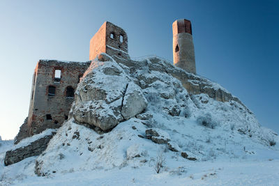 Low angle view of historic building against sky