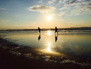 Scenic view of sea at sunset