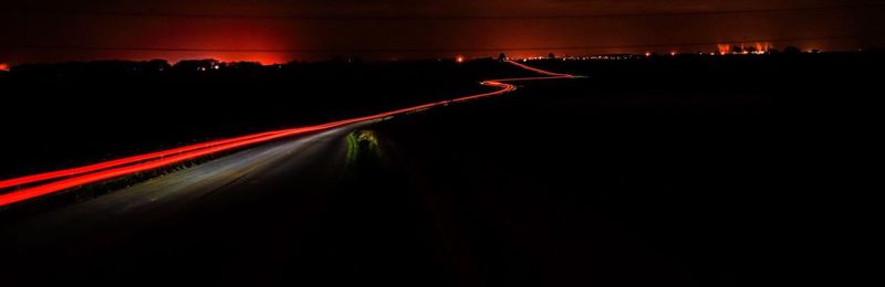 Light trails on road at night