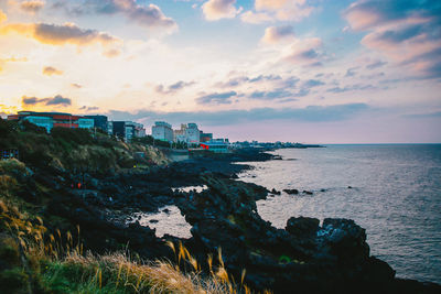 Scenic view of sea against sky during sunset