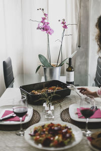 Flower vase on table at home