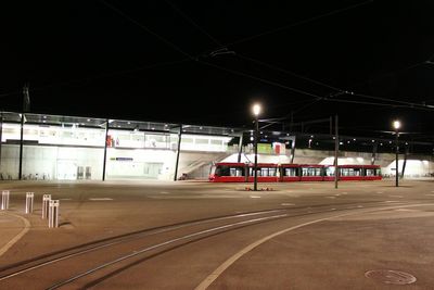 Illuminated bus at night