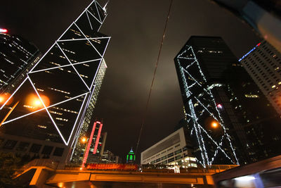 Low angle view of illuminated building at night