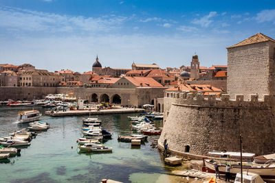 Dubrovnik city old port marina and fortifications