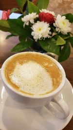 Close-up of cappuccino on table