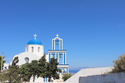 High section of church against blue sky