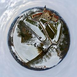 High angle view of reflection in city against sky