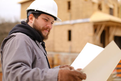 Portrait of man working in office