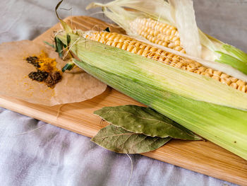 High angle view of vegetables on cutting board