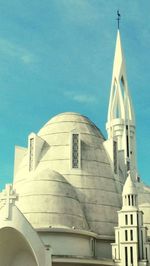 Low angle view of church against blue sky