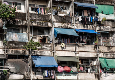 Clothes drying on clothesline outside building