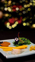 Close-up of christmas decorations on table