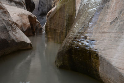 Flooded passageway in halls creek narrows, capitol reef backcountry.