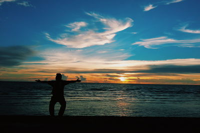 Scenic view of sea at sunset