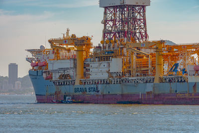 View of ship in sea against sky