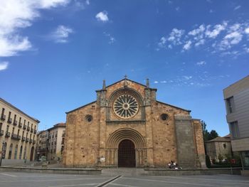 Facade of historic building against sky