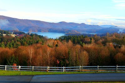 Scenic view of landscape and mountains against sky