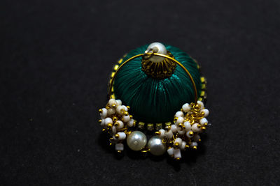 High angle view of decoration on table against black background