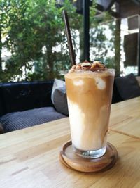 Close-up of coffee served on table