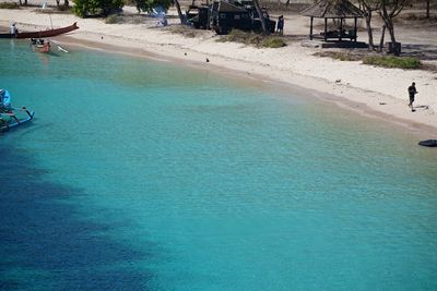 High angle view of people on swimming pool