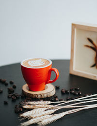 Close-up of coffee cup on table