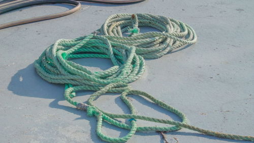 High angle view of ropes tied on rope